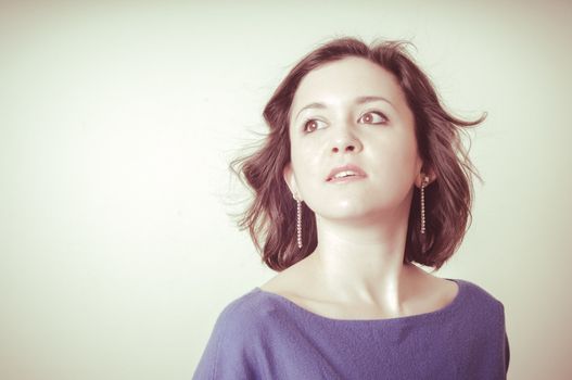 vintage portrait of young woman on vignetting background
