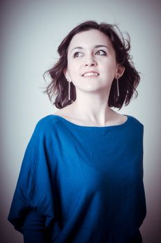 vintage portrait of young woman on vignetting background