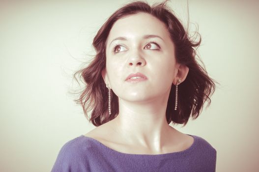vintage portrait of young woman on vignetting background