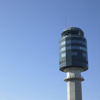 air traffic control tower and blue aky