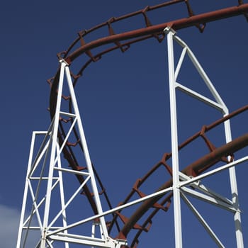 amusement park ride against blue sky