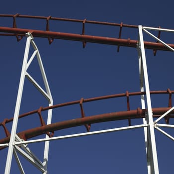 amusement park ride against blue sky