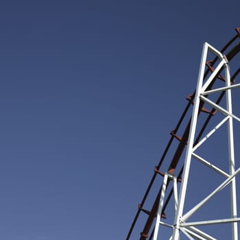 amusement park ride against blue sky