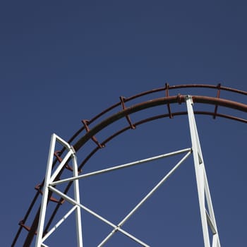 amusement park ride against blue sky