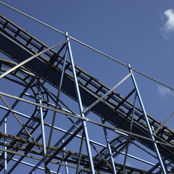 amusement park ride against blue sky