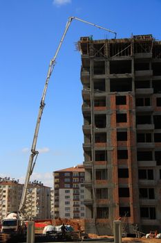 construction of building with cement mixture machine