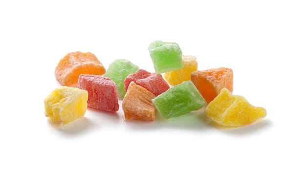 Some isolated coloured candied fruit on the white background