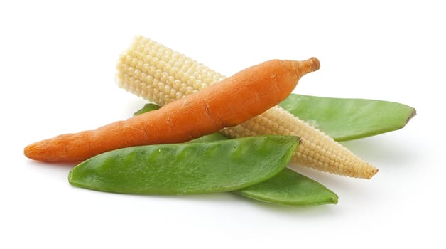 Corn, carrot and green peas on the white background