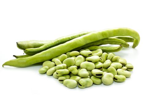 some raw broad beans on white background