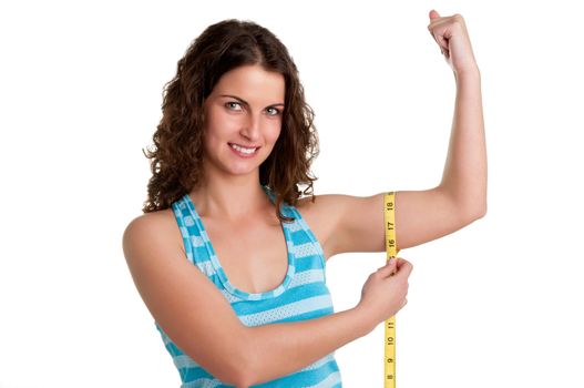 Surprised woman measuring her Biceps, isolated in a white background