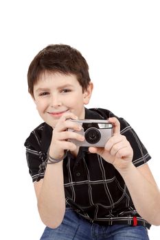 small boy photographing horizontal with digital camera on white background
