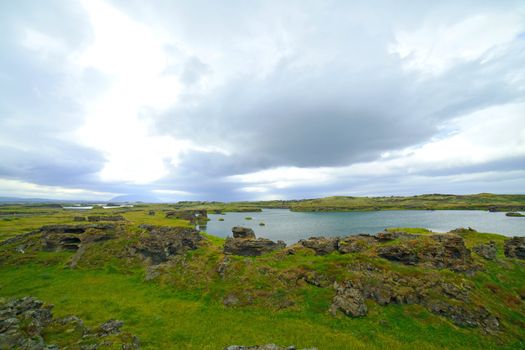 Iceland landscape at summer cloudy day. Mountain lake Myvatn.