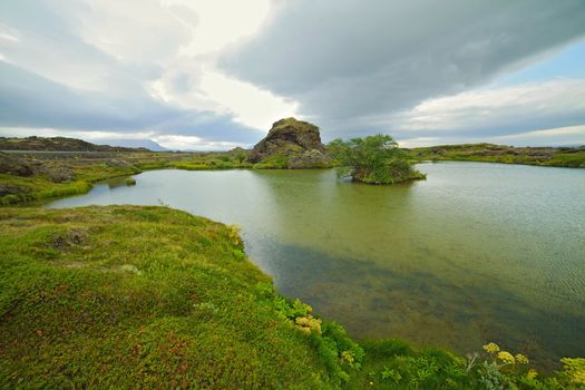 Iceland landscape at summer cloudy day. Mountain lake Myvatn.