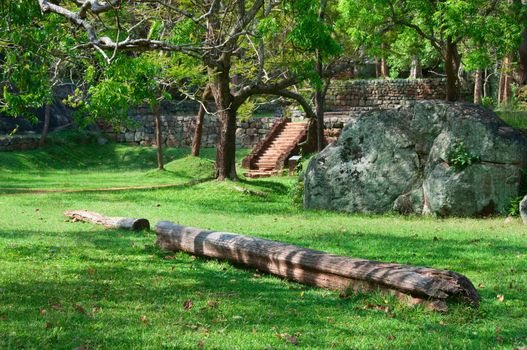 Sigiriya castle ruins, ancient steps with log on front, Sri Lanka