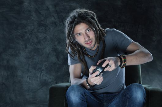 Young man playing Videogames