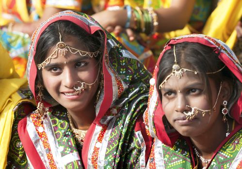 PUSHKAR, INDIA - NOVEMBER 21:  An unidentified girls in colorful ethnic attire attends at the Pushkar fair on November 21, 2012 in Pushkar, Rajasthan, India.