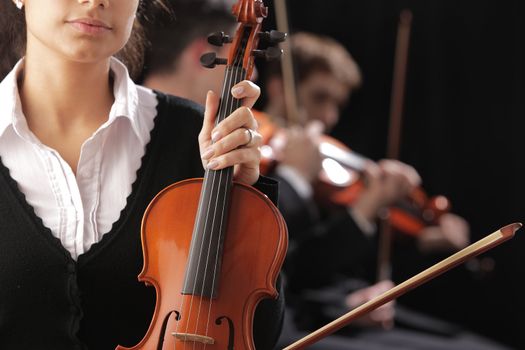 Violinist woman to a classical music concert