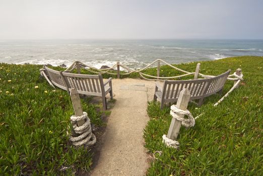 Benches facing the Pacific Ocean at Point Montara Fog Signal and Light Station State Park off of Highway 1 approximately 25 miles south of San Francisco, California