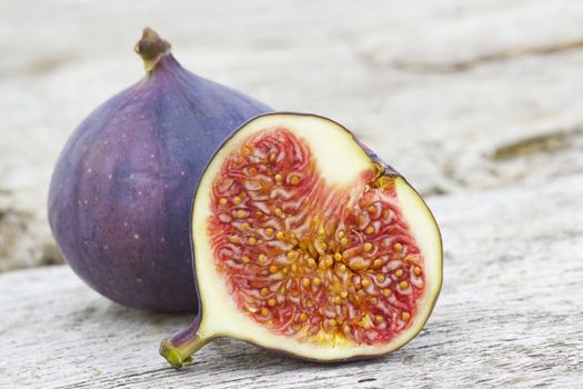 fresh figs on old wooden background