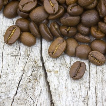 coffee beans on old wooden background