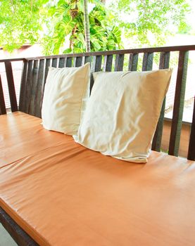 Relaxing seat sofa with pillows on terrace