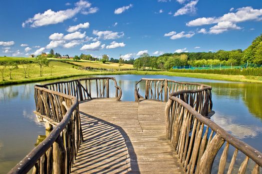 Lake in green nature wooden boardwalk, Prigorje region, Croatia