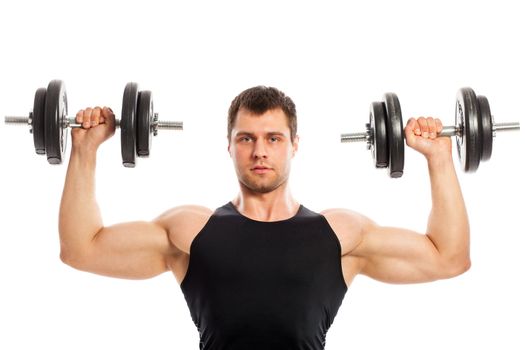 Handsome guy working out with dumbbells isolated over white background