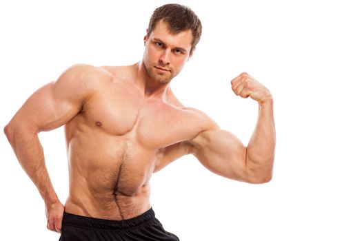 Handsome muscular guy with naked torso isolater over a white background