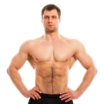 Handsome muscular guy with naked torso isolater over a white background