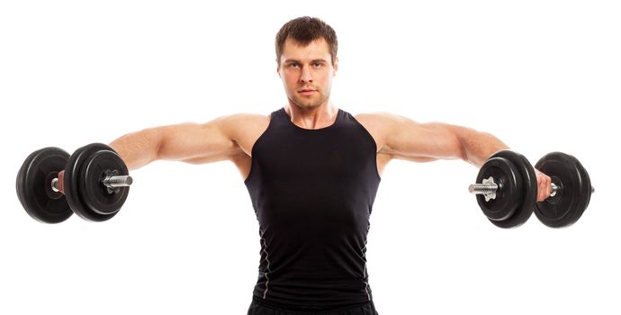 Handsome guy working out with dumbbells isolated over white background