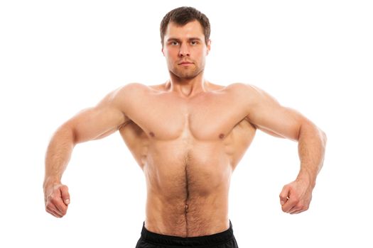 Handsome muscular guy with naked torso isolater over a white background