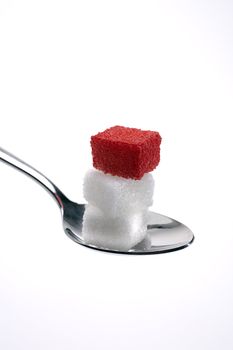 Sugar cubes with one red sugar cube