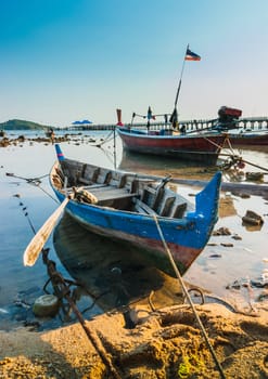 Fishing boats on the sea shore in Phuket, Thailand