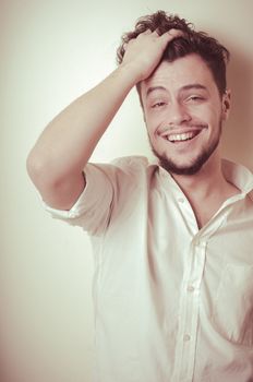 young modern stylish man on vignetting background
