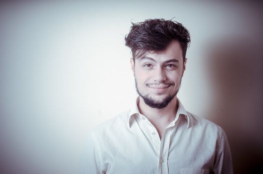 young modern stylish man on vignetting background
