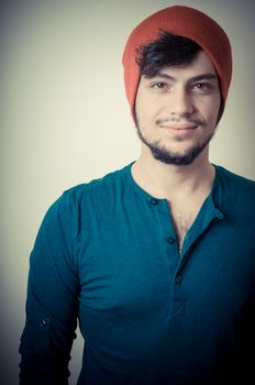 young modern stylish man on vignetting background