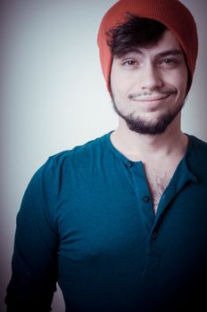 young modern stylish man on vignetting background