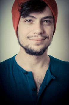 young modern stylish man on vignetting background