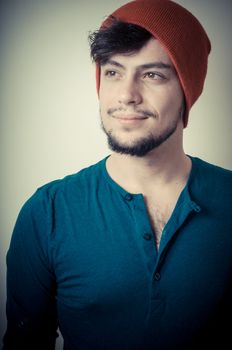 young modern stylish man on vignetting background