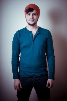 young modern stylish man on vignetting background