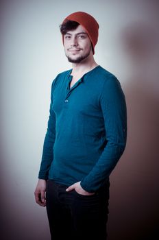 young modern stylish man on vignetting background