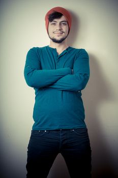 young modern stylish man on vignetting background