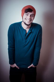 young modern stylish man on vignetting background