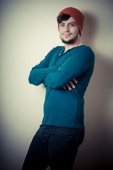 young modern stylish man on vignetting background