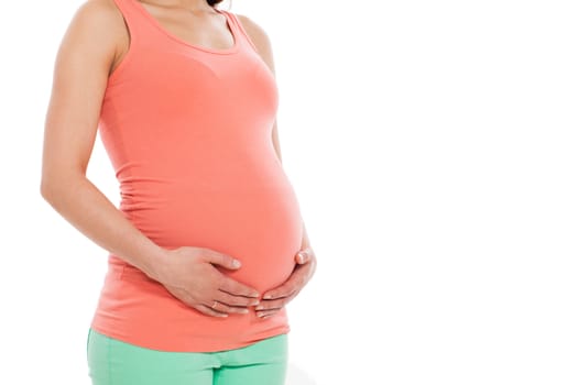 Beautiful pregnant belly on a white background