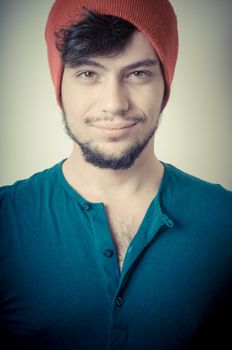 young modern stylish man on vignetting background