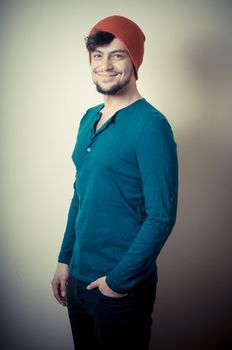 young modern stylish man on vignetting background