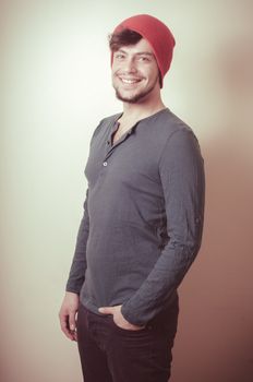 young modern stylish man on vignetting background