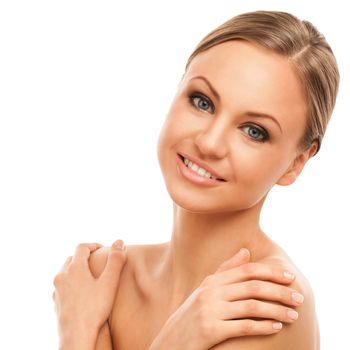 Beautiful young caucasian woman with natural makeup isolated over white background