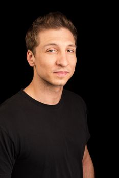 Cute European adult male in black shirt